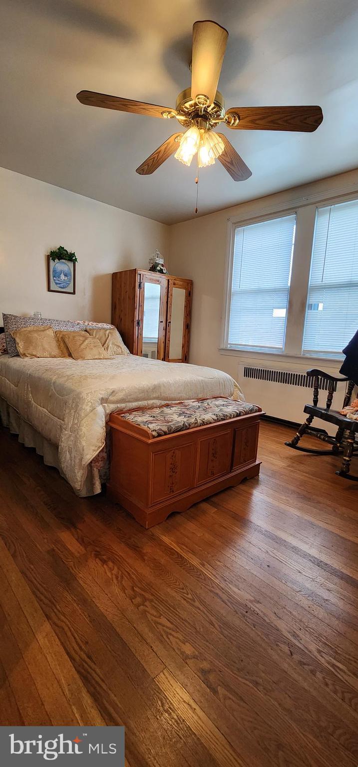 5624 Arbor Street Philadelphia, PA 19120 - Photo 10 of 17 a bedroom with a bed and window
