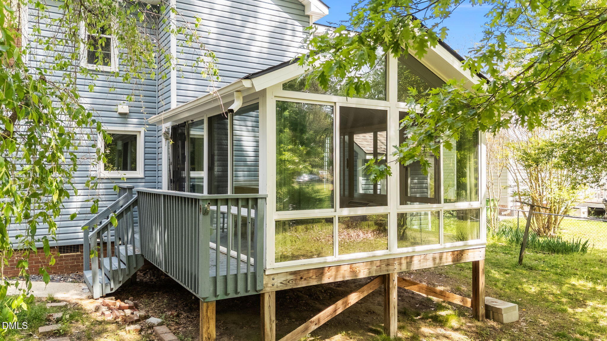 804 Olive Street Apex, NC 27502 - Photo 11 of 40 a porch with a seating space