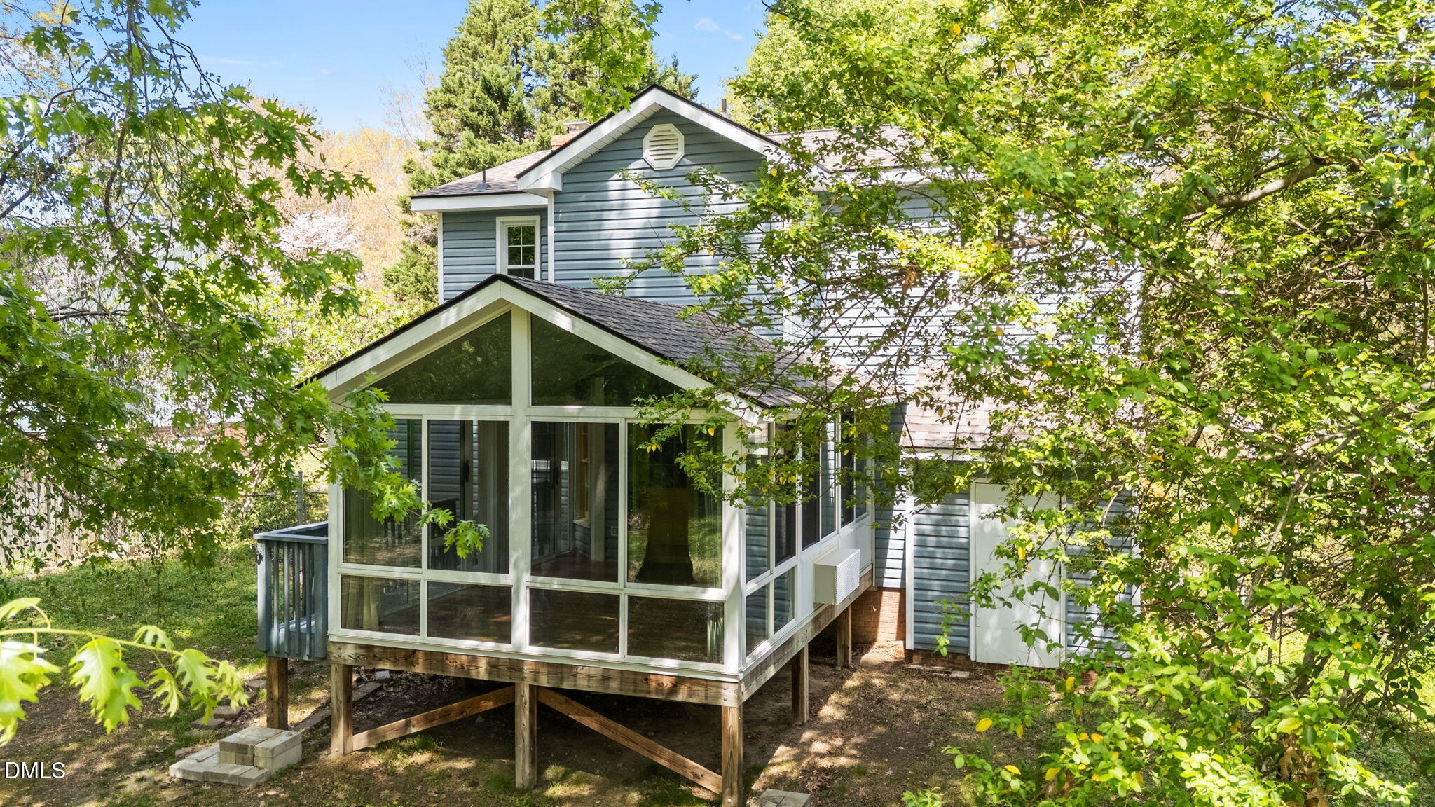 804 Olive Street Apex, NC 27502 - Photo 13 of 40 a house with trees in front of it