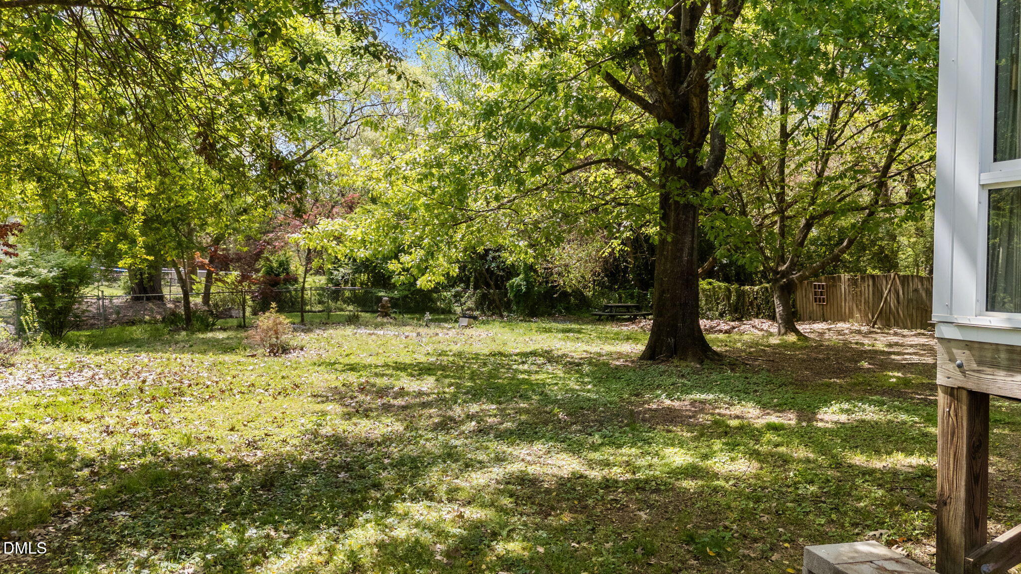 804 Olive Street Apex, NC 27502 - Photo 14 of 40 a view of a yard with a tree
