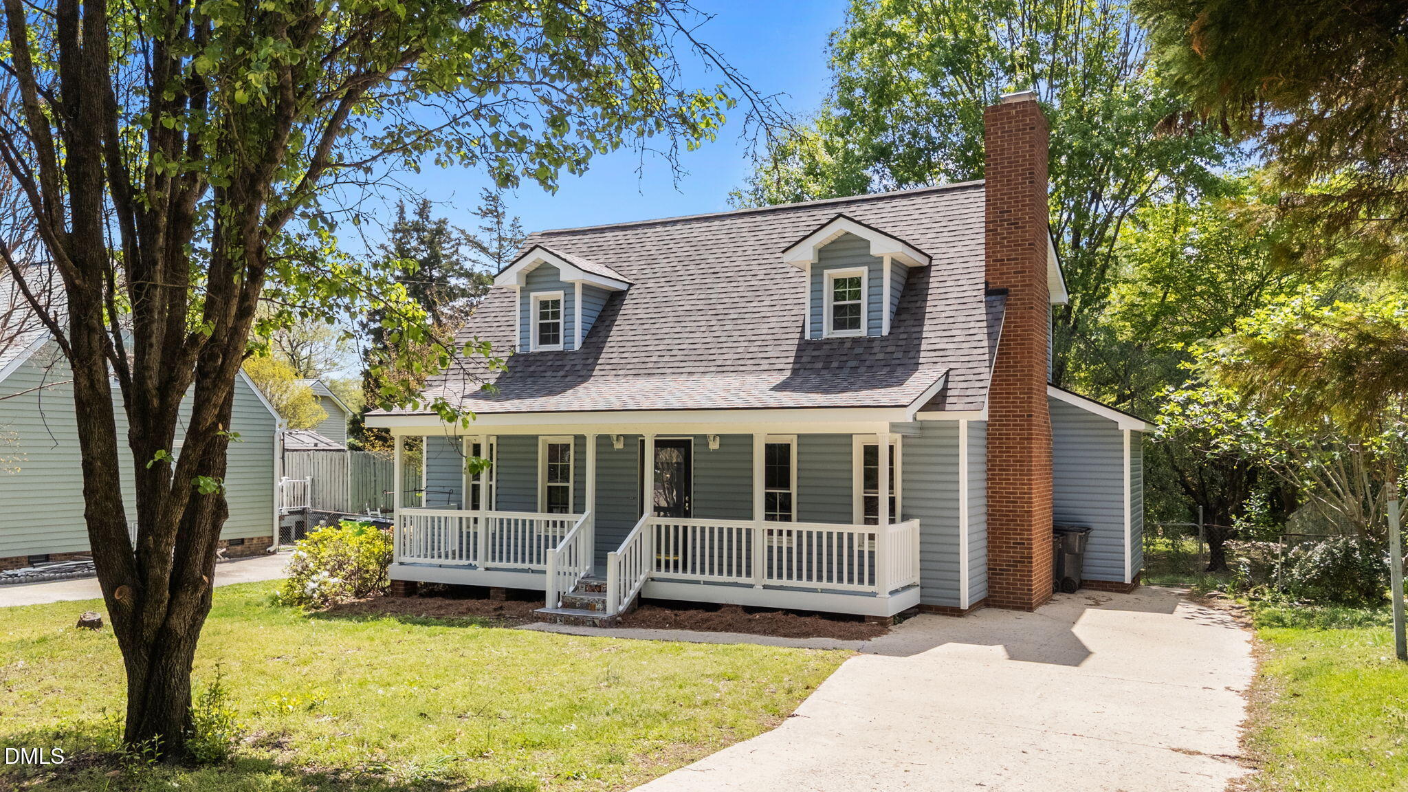 804 Olive Street Apex, NC 27502 - Photo 2 of 40 a view of a house with a yard balcony and seating space