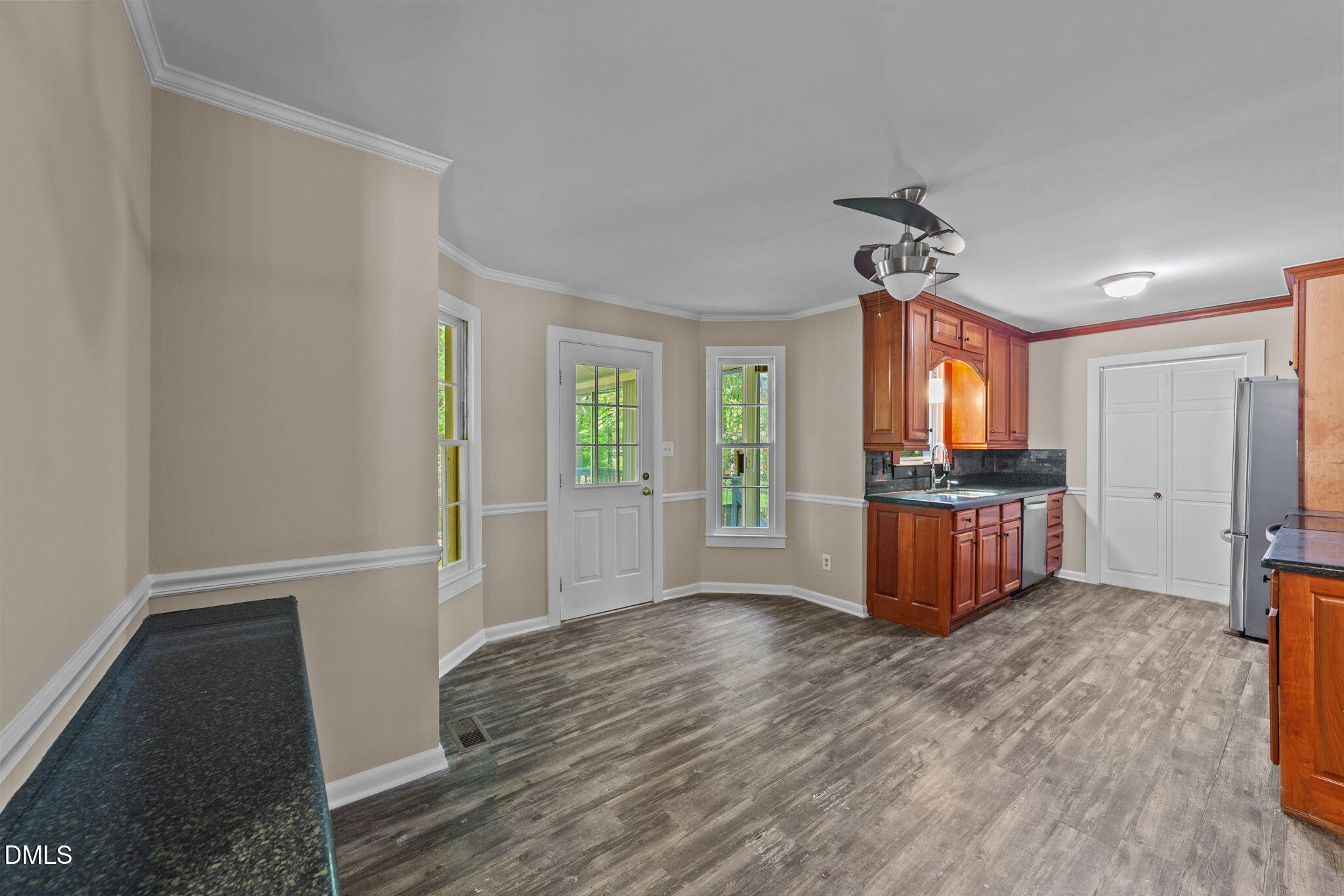 804 Olive Street Apex, NC 27502 - Photo 21 of 40 a view of kitchen with sink and wooden floor