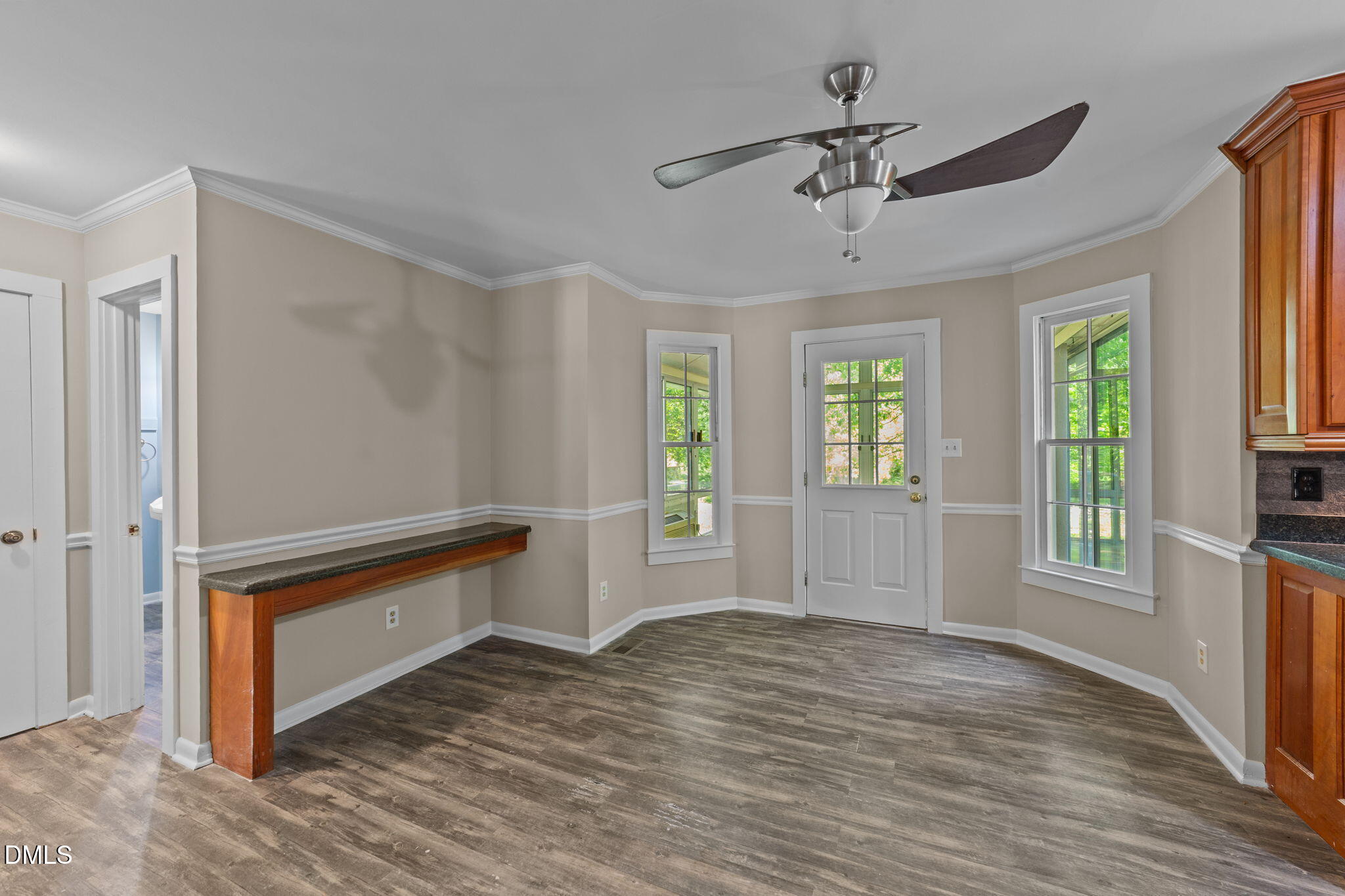 804 Olive Street Apex, NC 27502 - Photo 22 of 40 a view of an empty room with a window