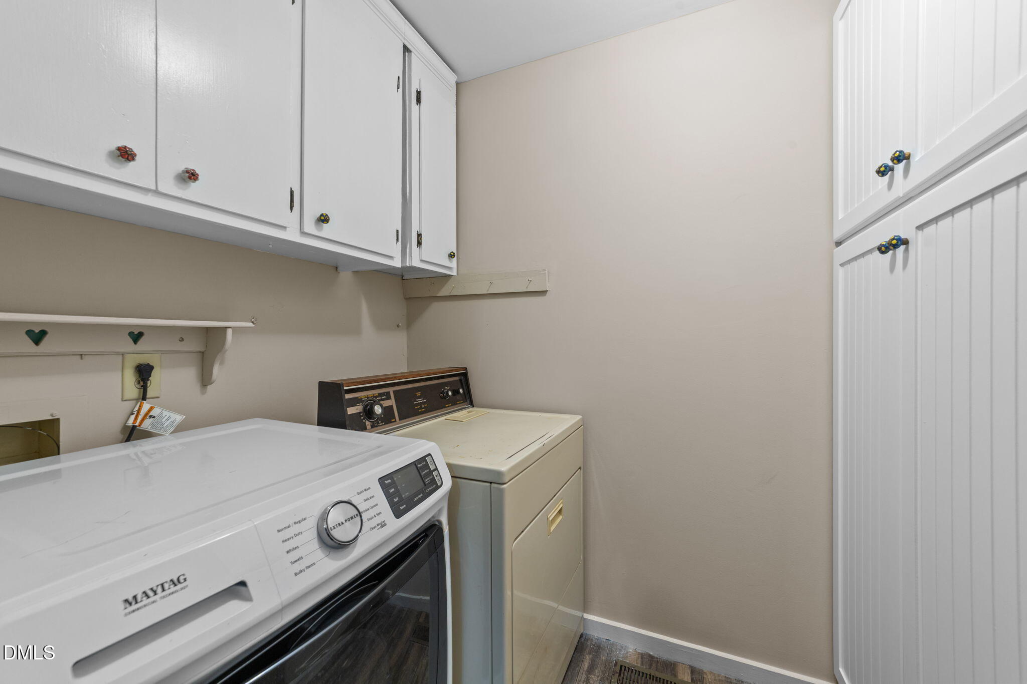 804 Olive Street Apex, NC 27502 - Photo 29 of 40 a utility room with dryer and washer