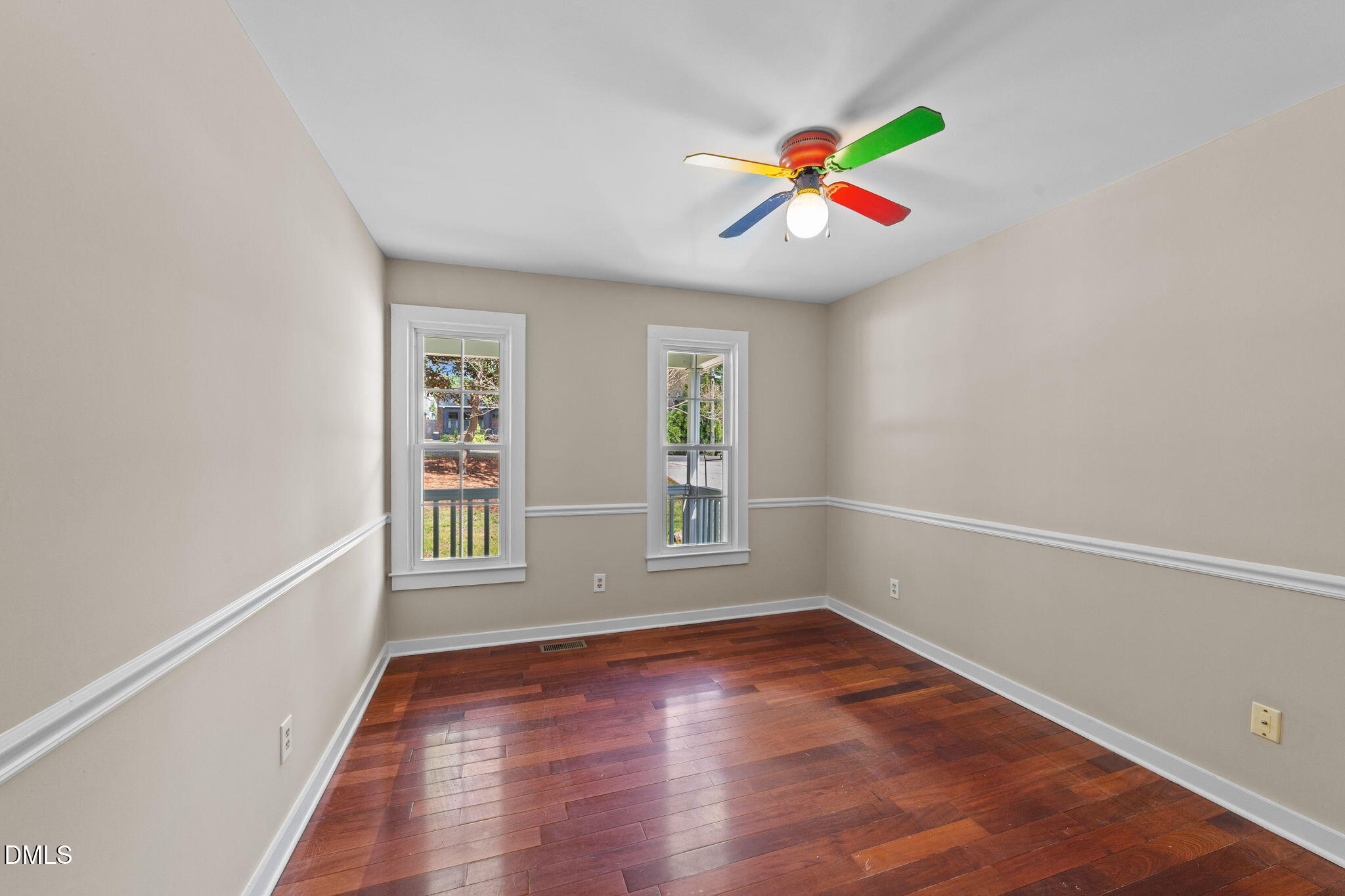 804 Olive Street Apex, NC 27502 - Photo 30 of 40 wooden floor in an empty room with a window