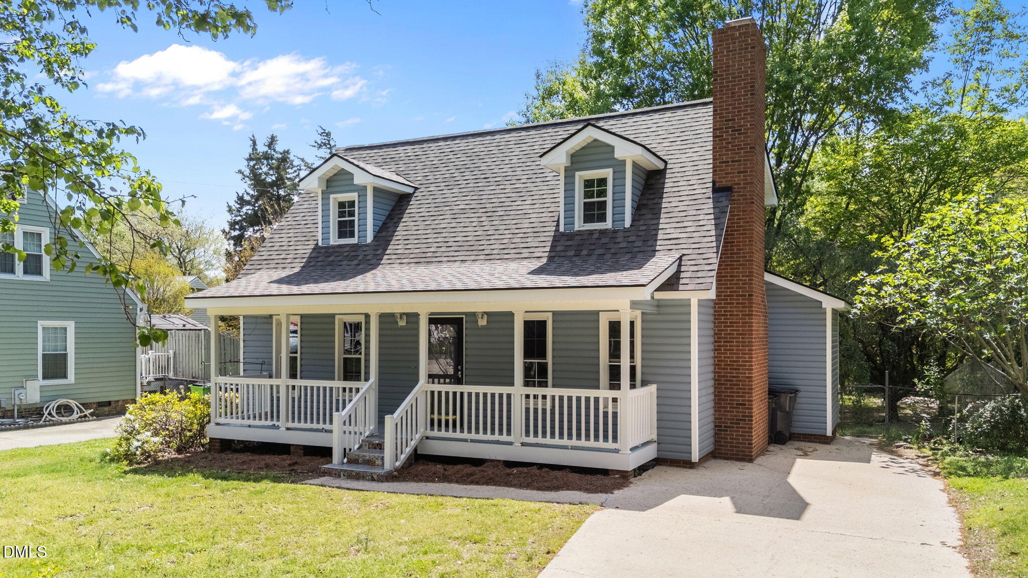 804 Olive Street Apex, NC 27502 - Photo 3 of 40 a view of house with a yard