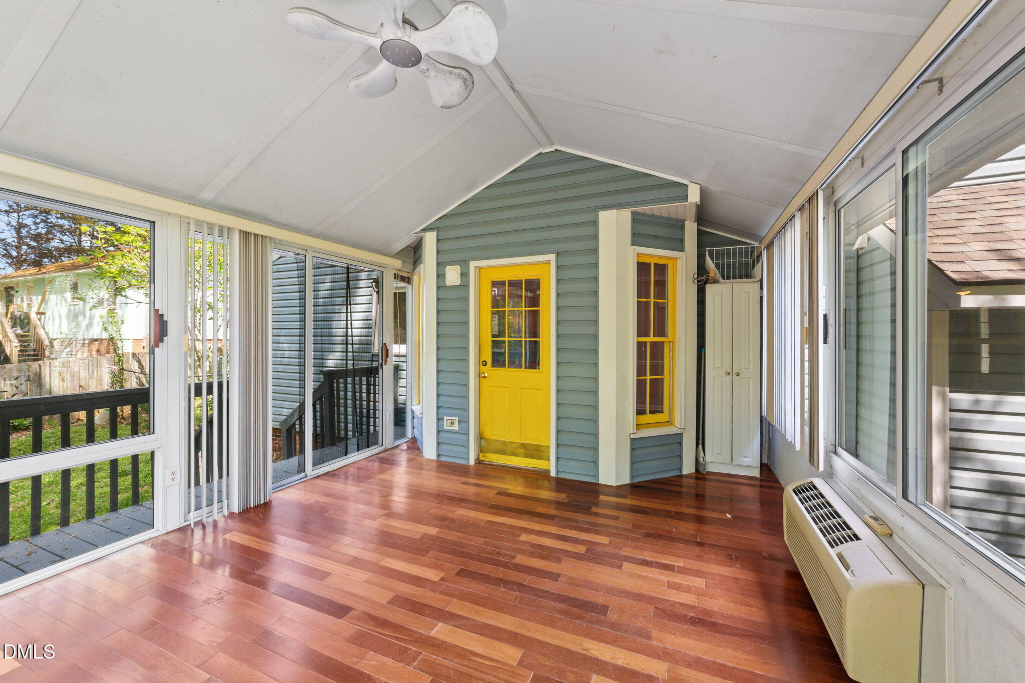 804 Olive Street Apex, NC 27502 - Photo 34 of 40 a view of an entryway with wooden floor