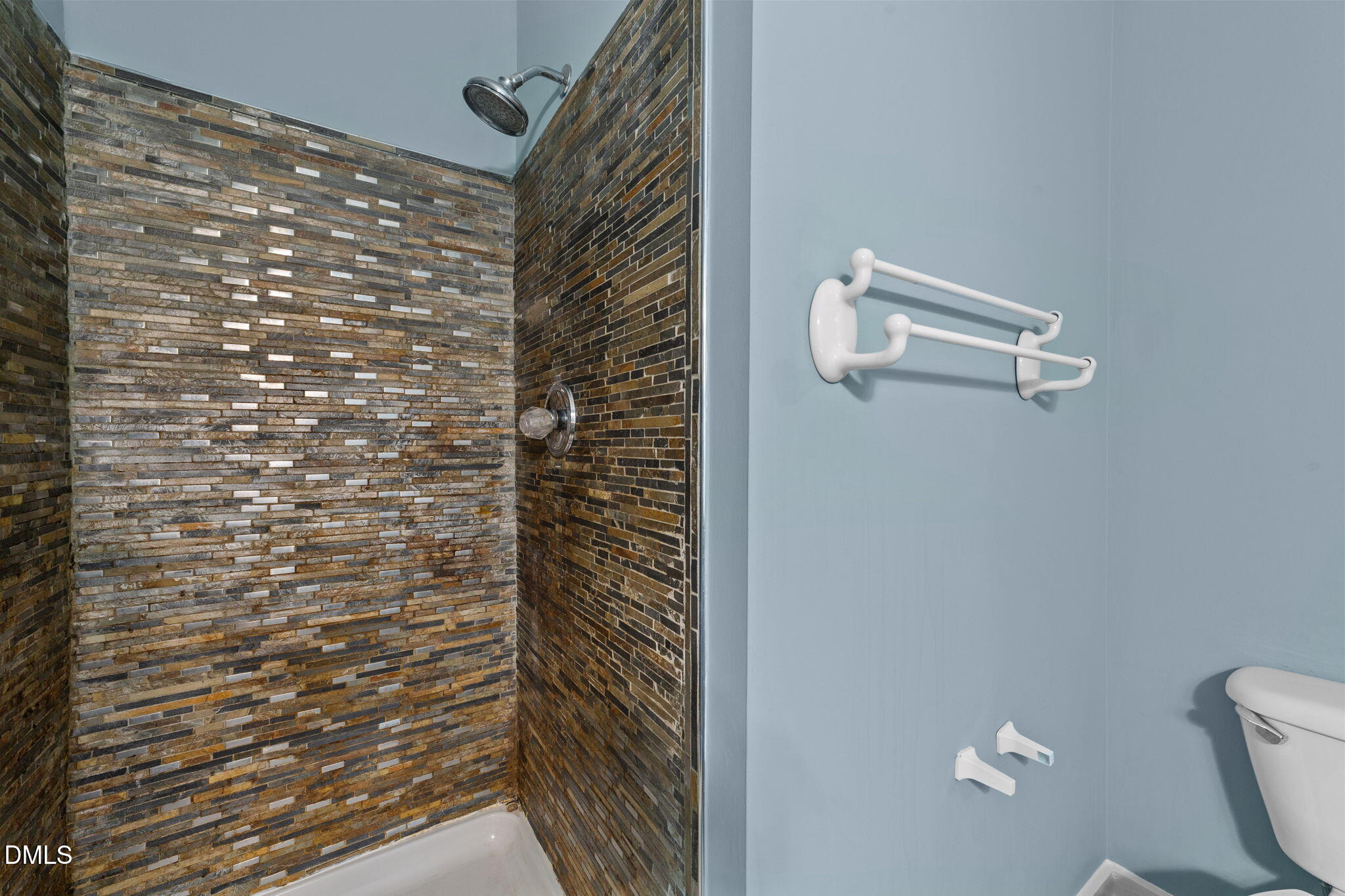 804 Olive Street Apex, NC 27502 - Photo 40 of 40 a bathroom with a shower