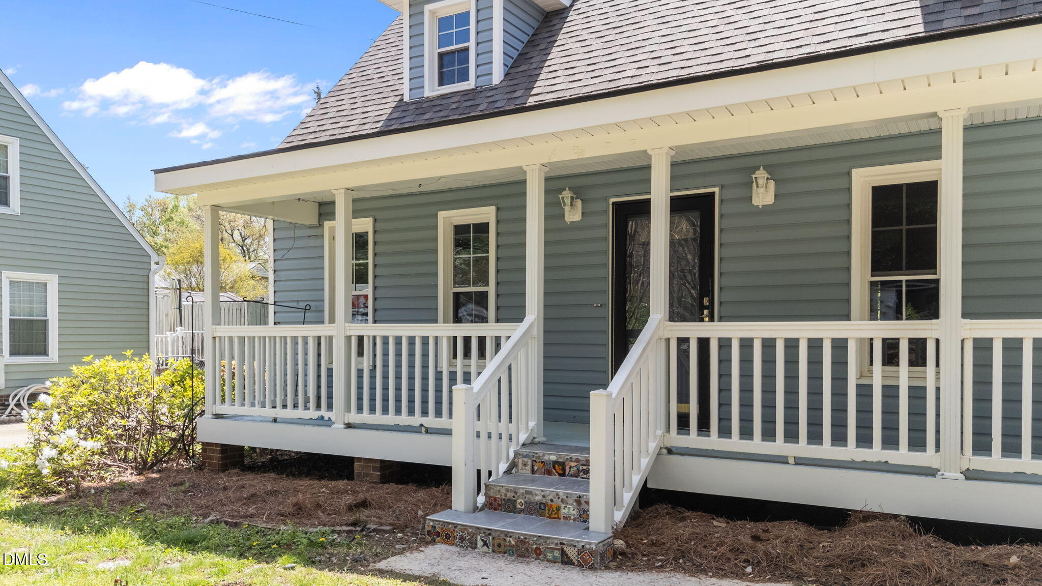 804 Olive Street Apex, NC 27502 - Photo 5 of 40 a view of a chair with a small deck