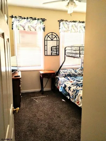 a view of a bedroom with a window