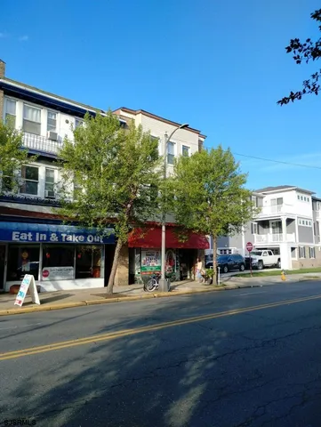 a view of a building with a street
