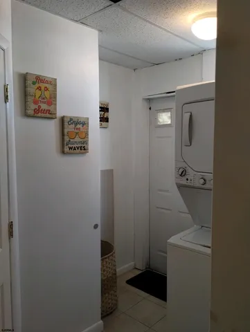 a bathroom with a shower and a sink