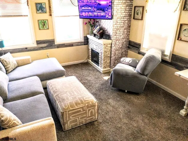 a living room with furniture and a couch