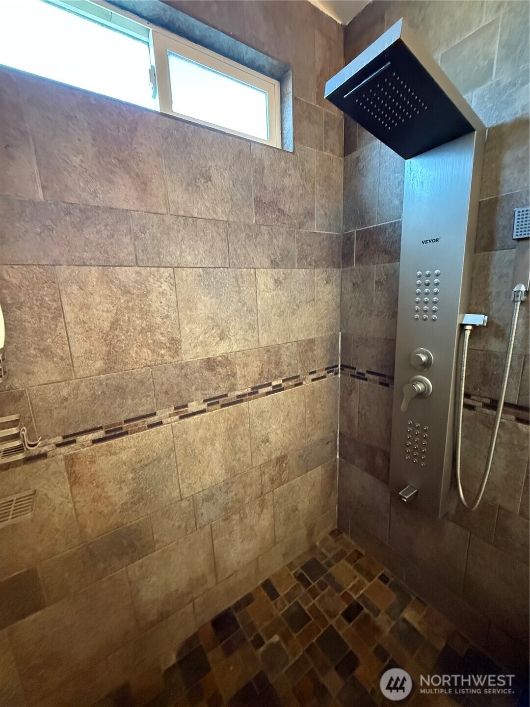 1919 Riddell Street Raymond, WA 98577 - Photo 14 of 25 a bathroom with a shower