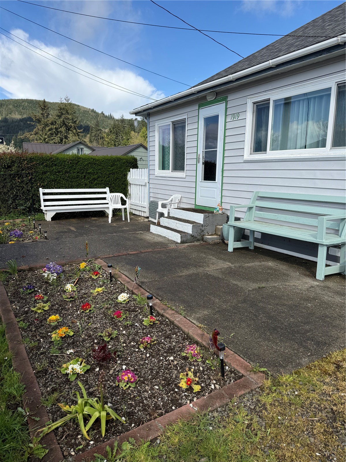 1919 Riddell Street Raymond, WA 98577 - Photo 2 of 25 a view of a house with a yard
