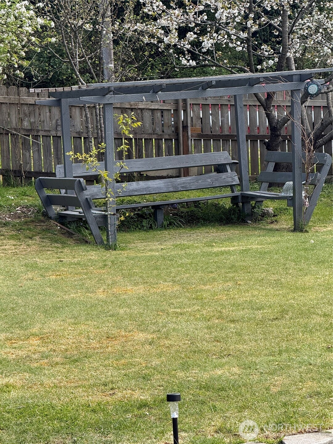 1919 Riddell Street Raymond, WA 98577 - Photo 24 of 25 a view of a chair and table in the patio