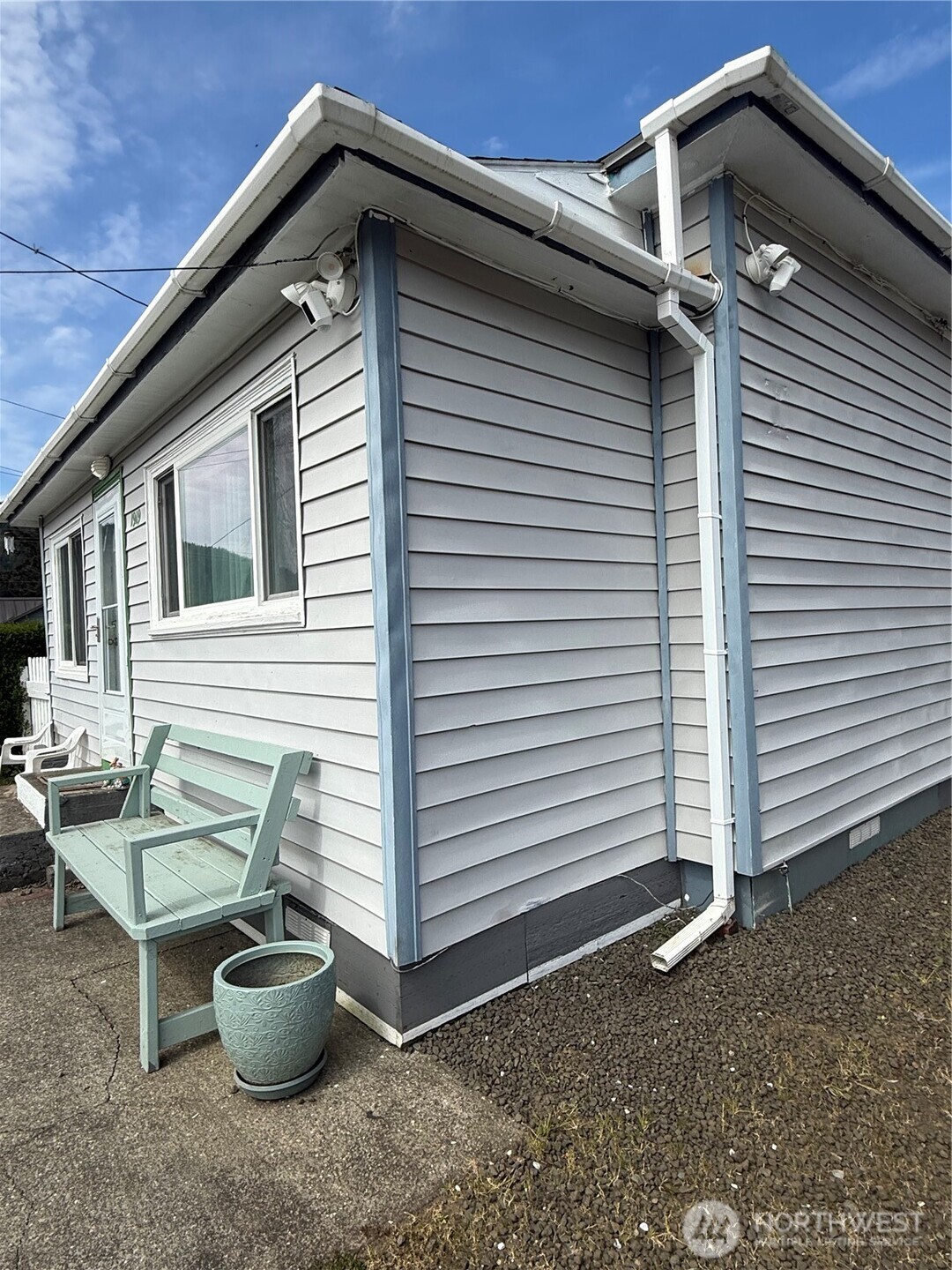 1919 Riddell Street Raymond, WA 98577 - Photo 4 of 25 a backyard of a house with barbeque oven and barbeque oven