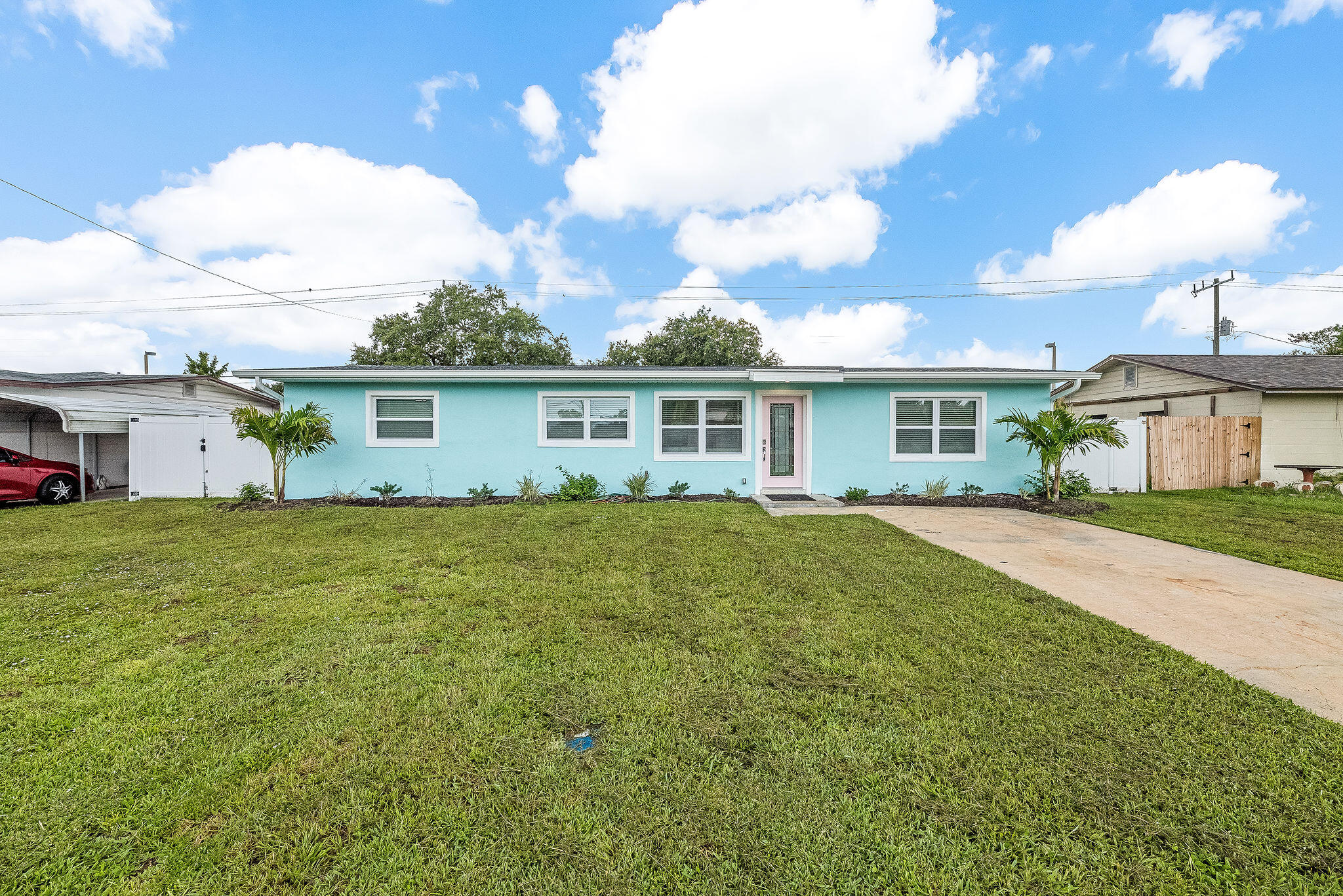 411 4th Street Merritt Island, FL 32953 - Photo 26 of 26 a view of a house with a backyard