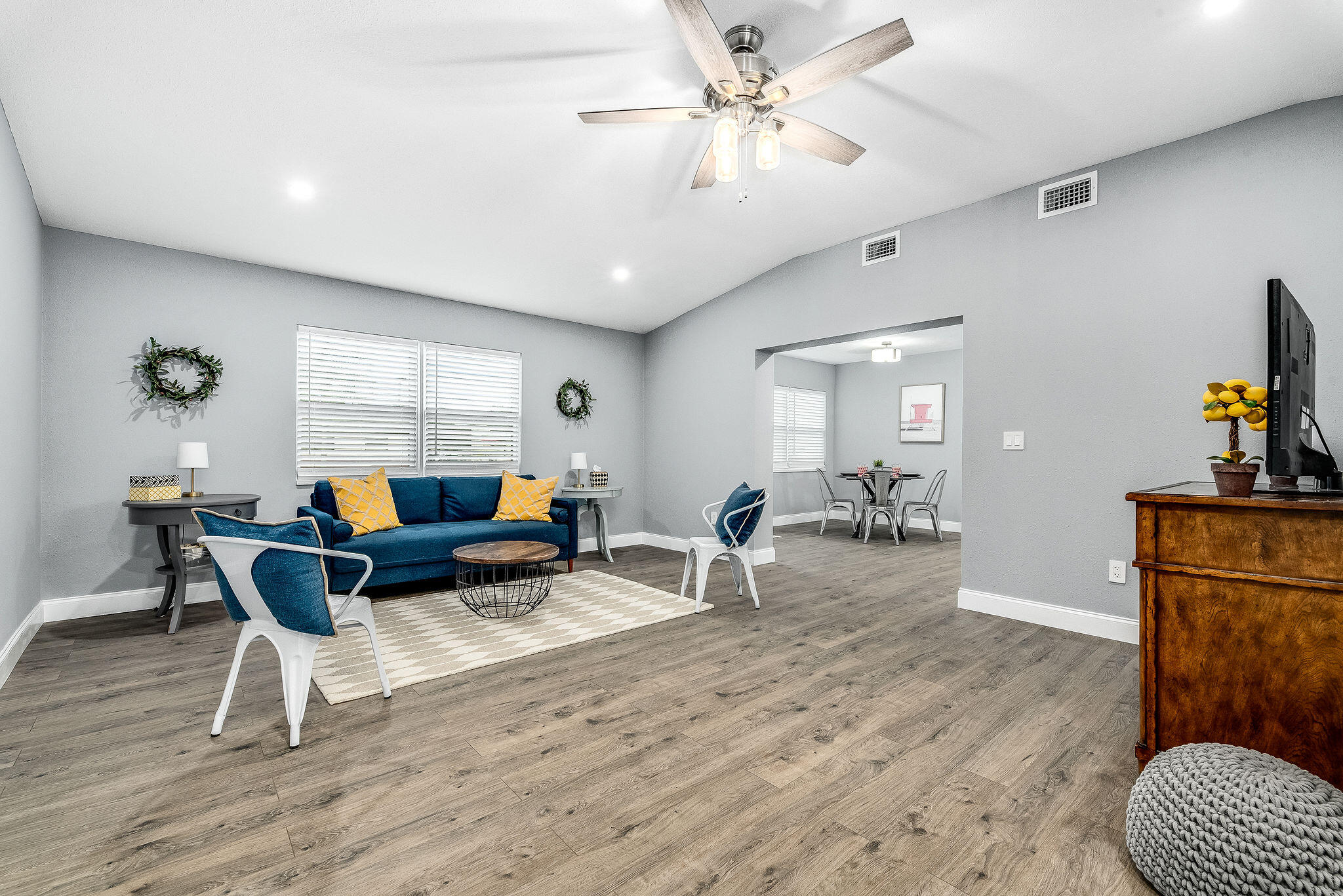 411 4th Street Merritt Island, FL 32953 - Photo 3 of 26 a living room with furniture and a wooden floor