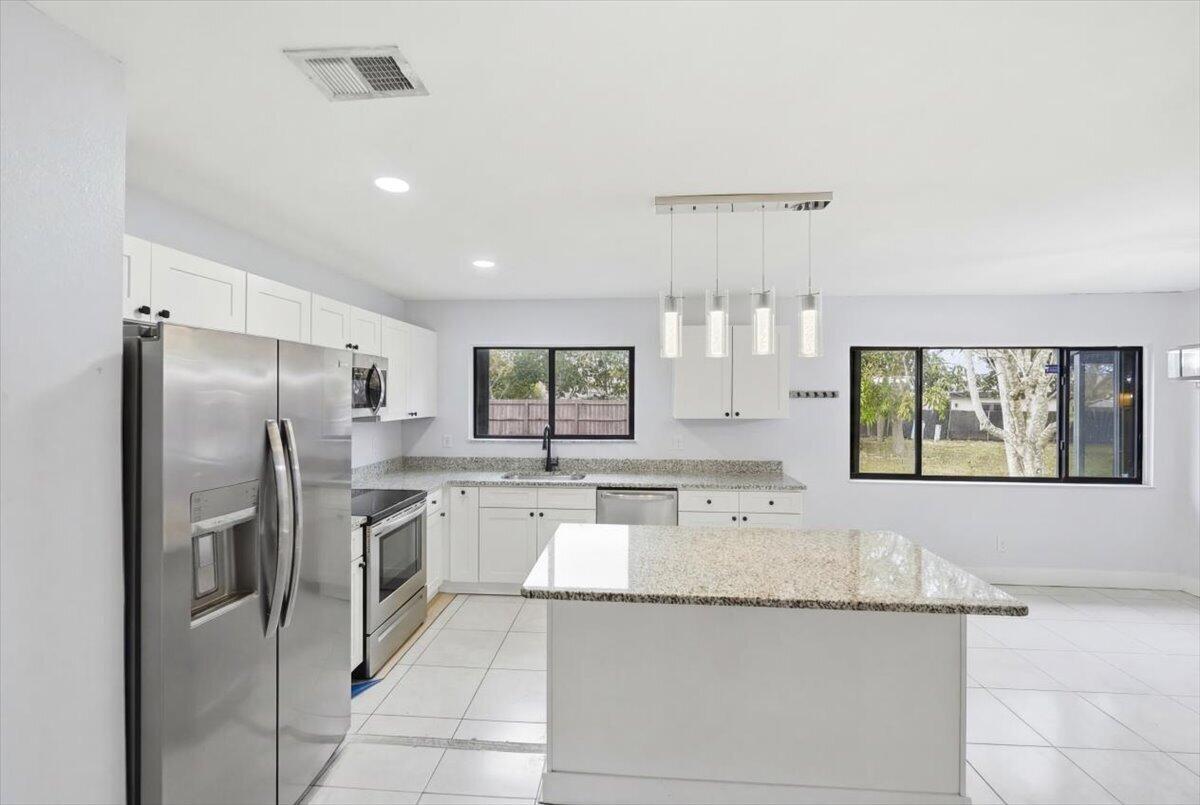 2080 Southeast Triumph Road Port St. Lucie, FL 34952 - Photo 9 of 33 35-DSC2007_re_edit_76840aec-d99d-4693-86