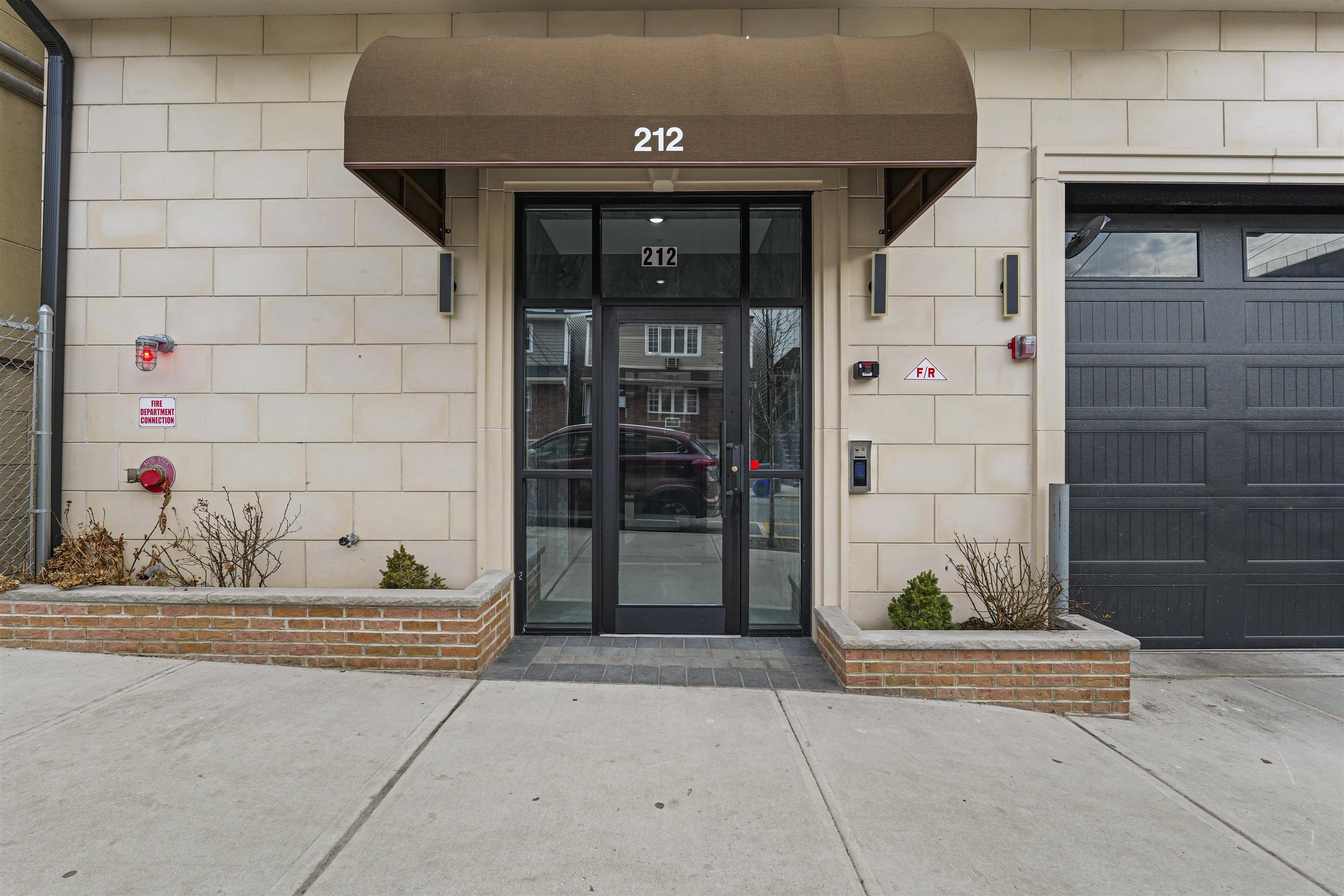 212 70th Street, Unit 404 Guttenberg, NJ 07093 - Photo 12 of 14 a view of entrance door of the house