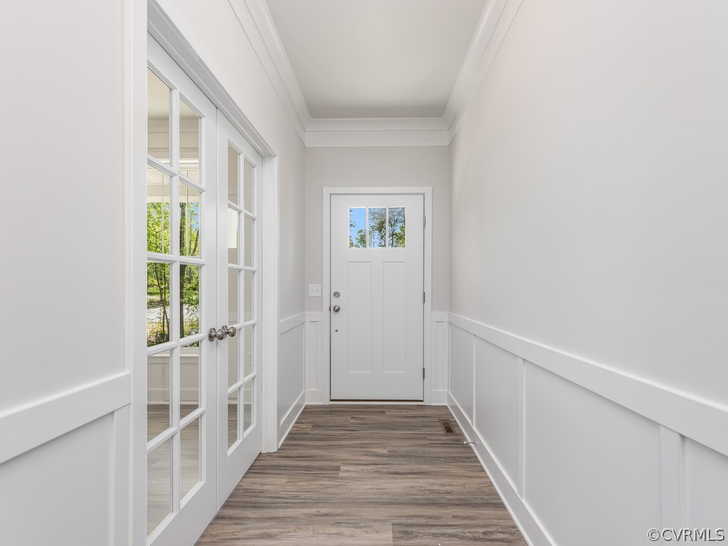 101 Indian Hills Road Locust Grove, VA 22508 - Photo 2 of 36 a view of a hallway with wooden floor and windows