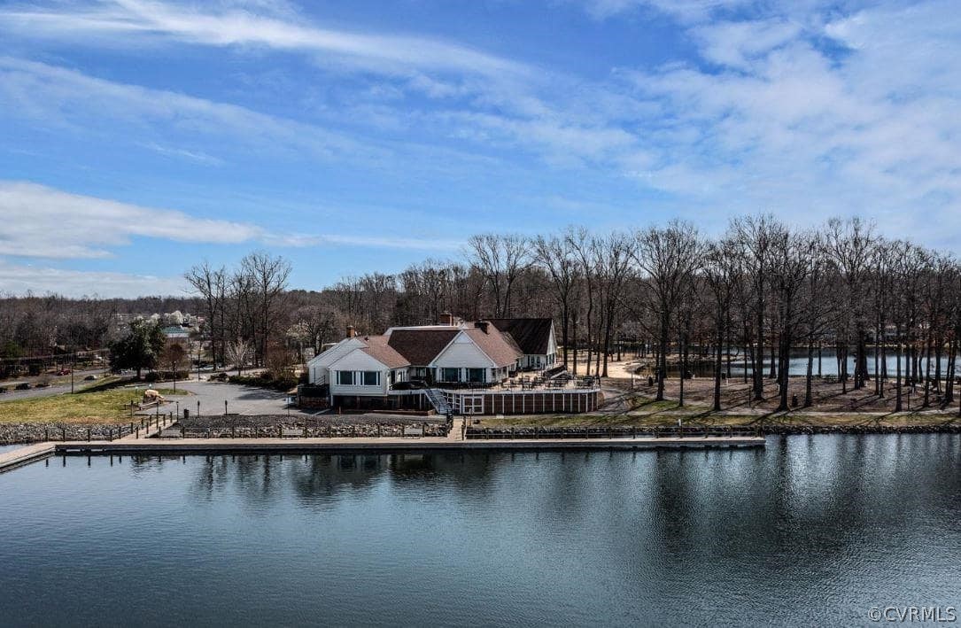 101 Indian Hills Road Locust Grove, VA 22508 - Photo 31 of 36 a view of a lake with boats and trees in the background