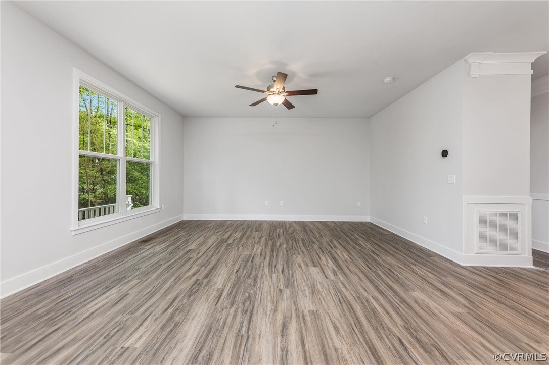 101 Indian Hills Road Locust Grove, VA 22508 - Photo 5 of 36 wooden floor in an empty room with a window