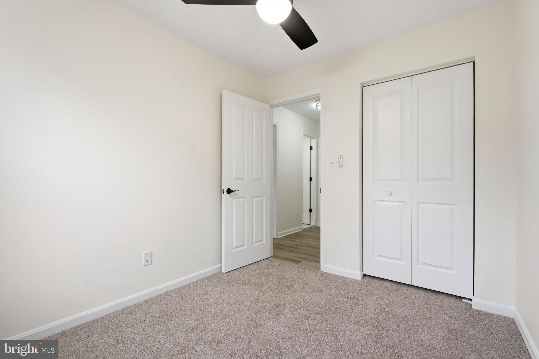 629 Nollmeyer Road Middle River, MD 21220 - Photo 14 of 35 an empty room with closet and windows