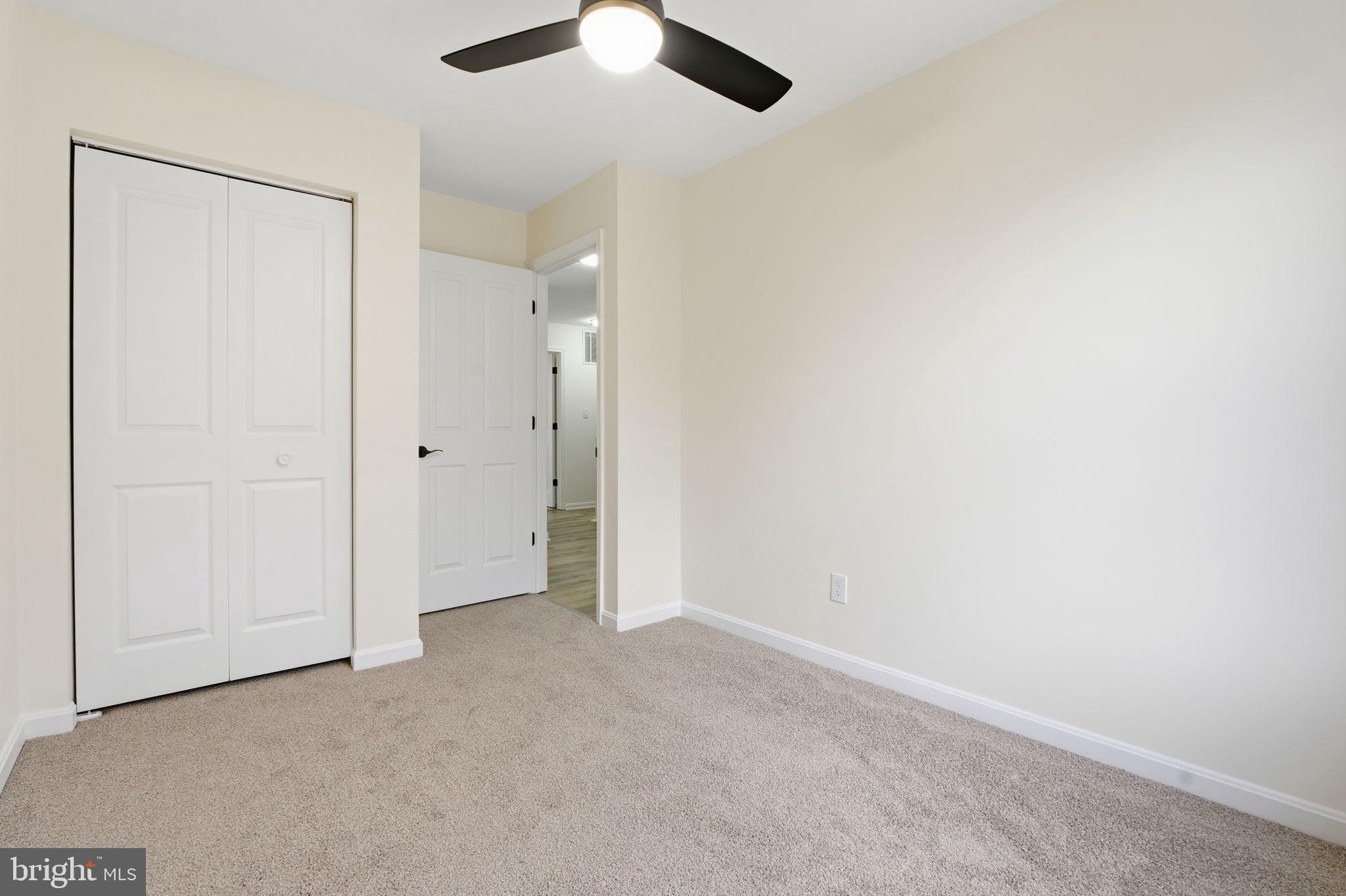 629 Nollmeyer Road Middle River, MD 21220 - Photo 17 of 35 an empty room with a empty space and a ceiling fan