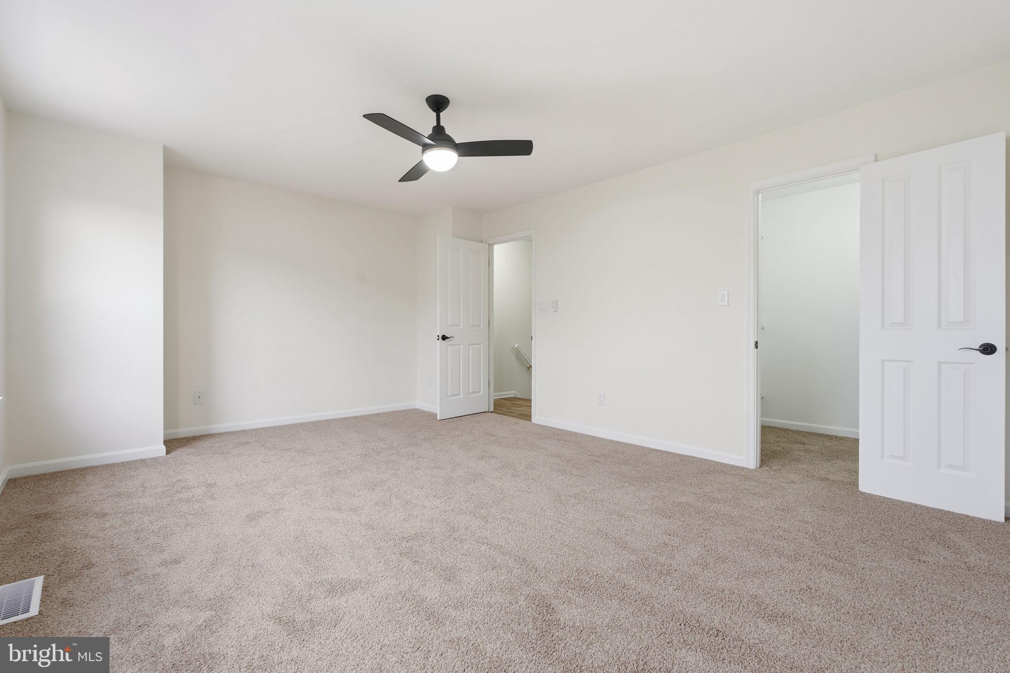 629 Nollmeyer Road Middle River, MD 21220 - Photo 20 of 35 a view of an empty room with a ceiling fan