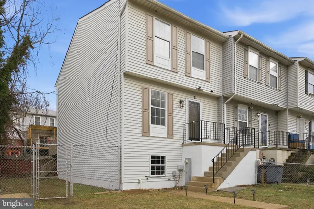 a front view of a house with garage