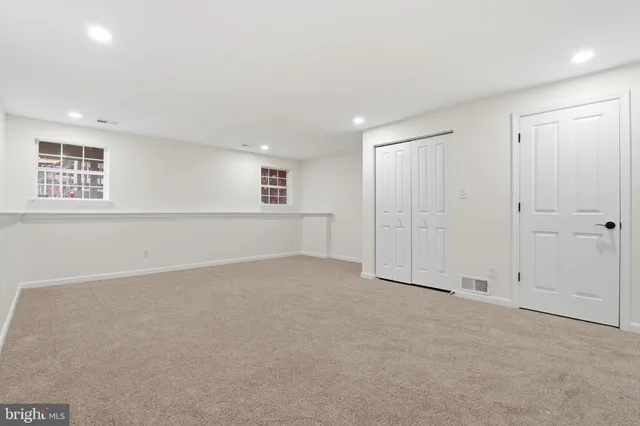 an empty room with an entryway