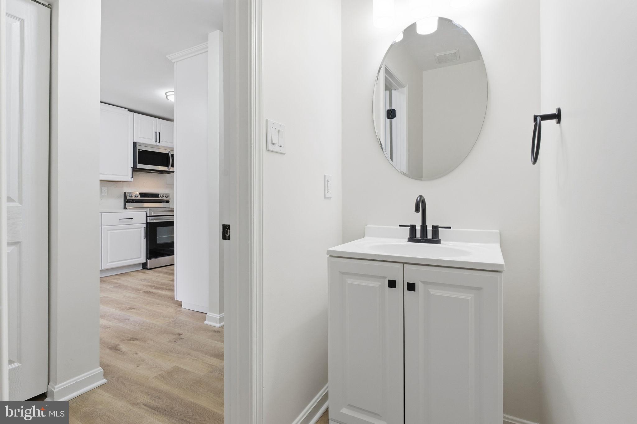 629 Nollmeyer Road Middle River, MD 21220 - Photo 30 of 35 a view of a bathroom from the hallway