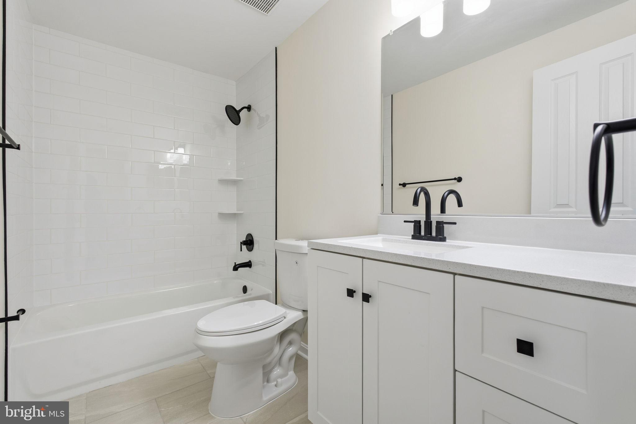 629 Nollmeyer Road Middle River, MD 21220 - Photo 32 of 35 a bathroom with a sink a toilet and shower