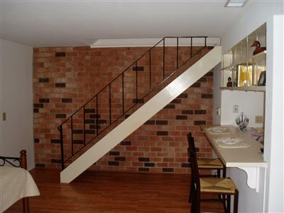 2012 West Steele Lane Santa Rosa, CA 95403 - Photo 3 of 10 Open stairway with iron railing leads to the bedrooms and bath on the upper level.
