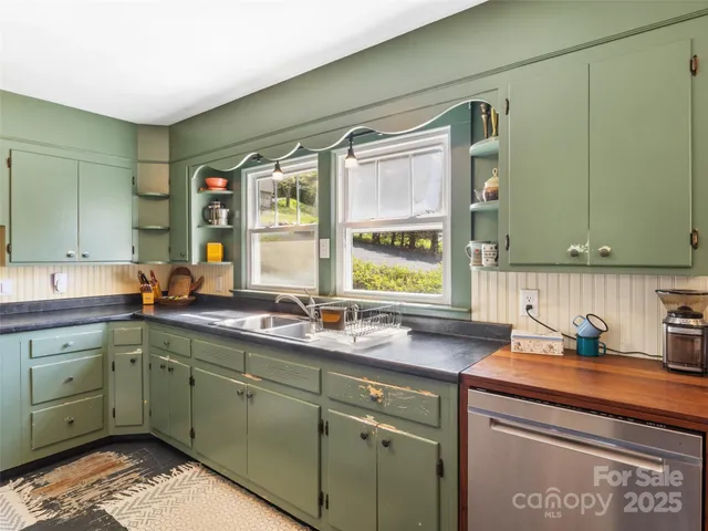a kitchen with a sink and a window