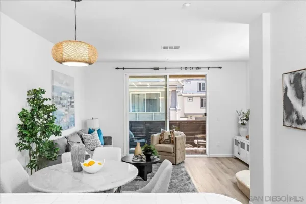 a living room with furniture and a table