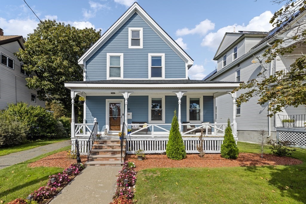 front view of a house with a yard