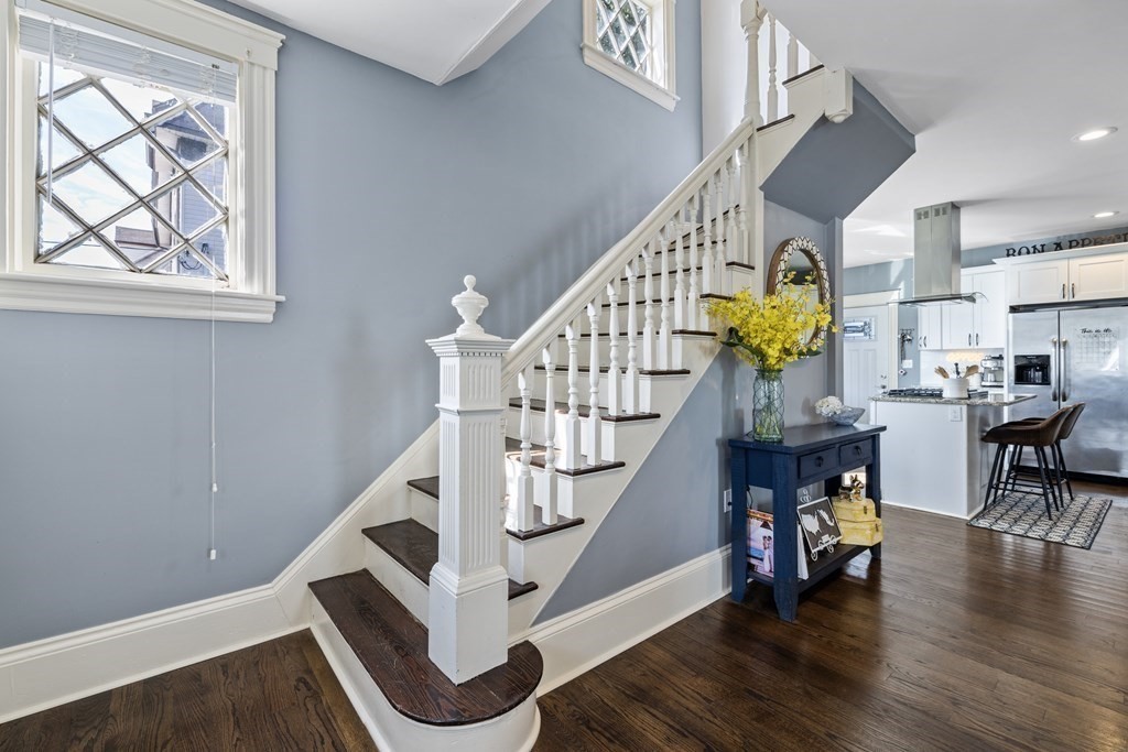 35 Jackson Street Saugus, MA 01906 - Photo 15 of 26 a view of entryway dining room and hall with wooden floor