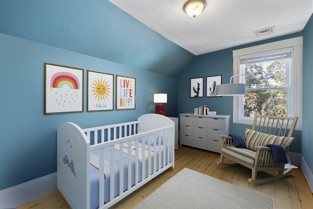 35 Jackson Street Saugus, MA 01906 - Photo 16 of 26 a bedroom with furniture and a window