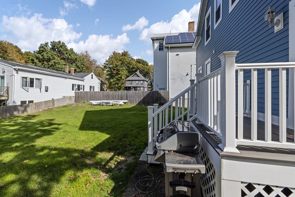 35 Jackson Street Saugus, MA 01906 - Photo 24 of 26 a view of a house with backyard and sitting area