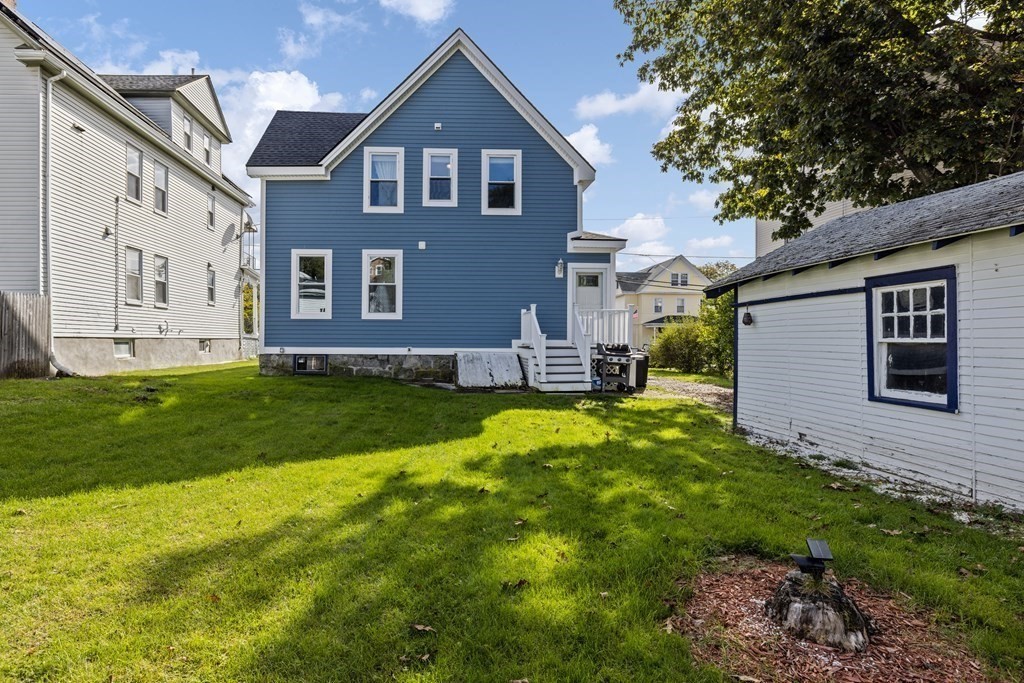35 Jackson Street Saugus, MA 01906 - Photo 26 of 26 a front view of a house with a yard