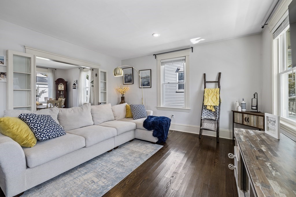 35 Jackson Street Saugus, MA 01906 - Photo 5 of 26 a living room with furniture and a wooden floor