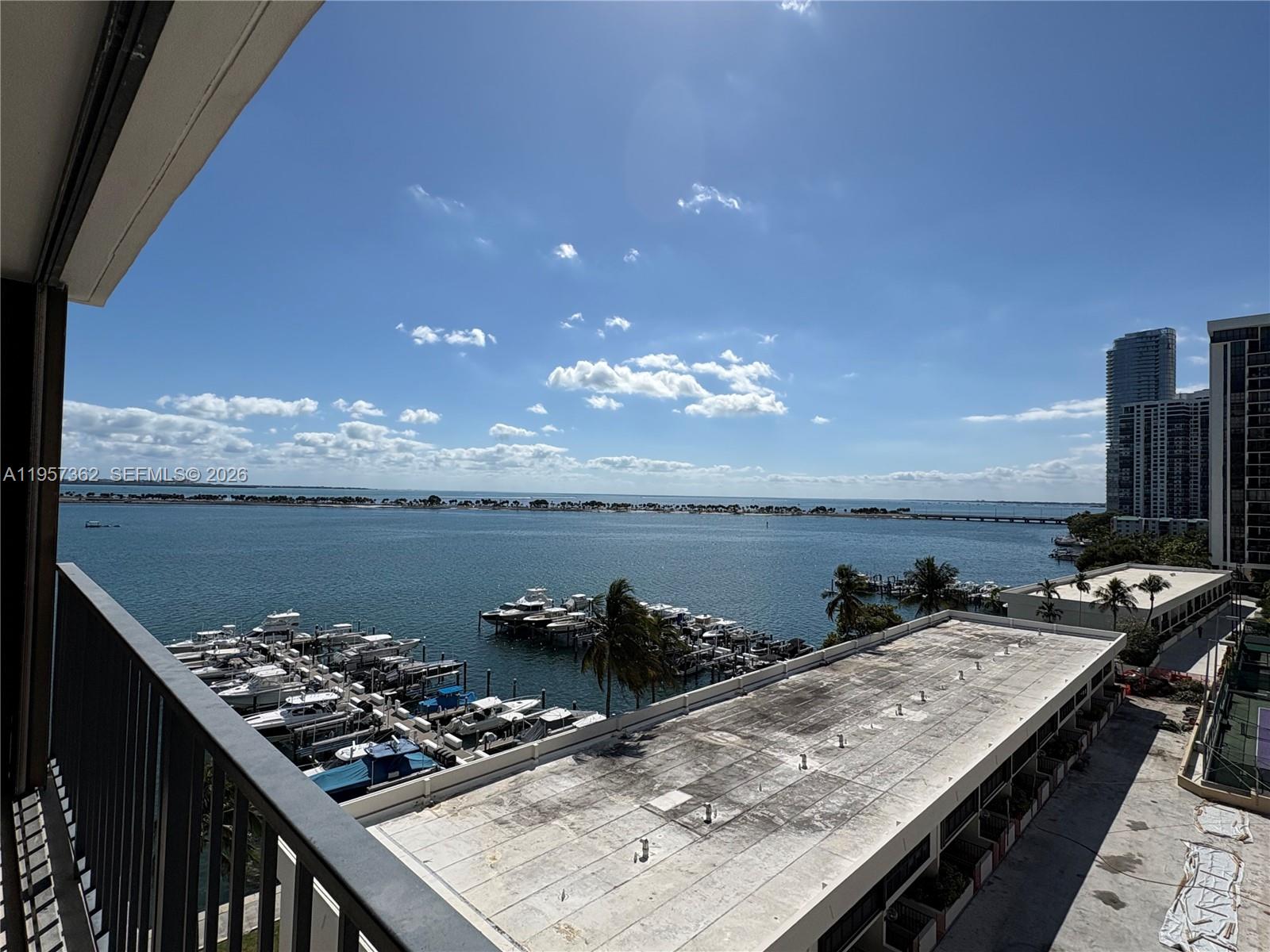 1865 Brickell Avenue, Unit A810 Miami, FL 33129 - Photo 22 of 24 a view of a terrace with food and sitting space