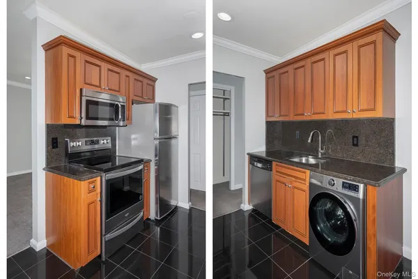 a kitchen with a stove a sink and a microwave