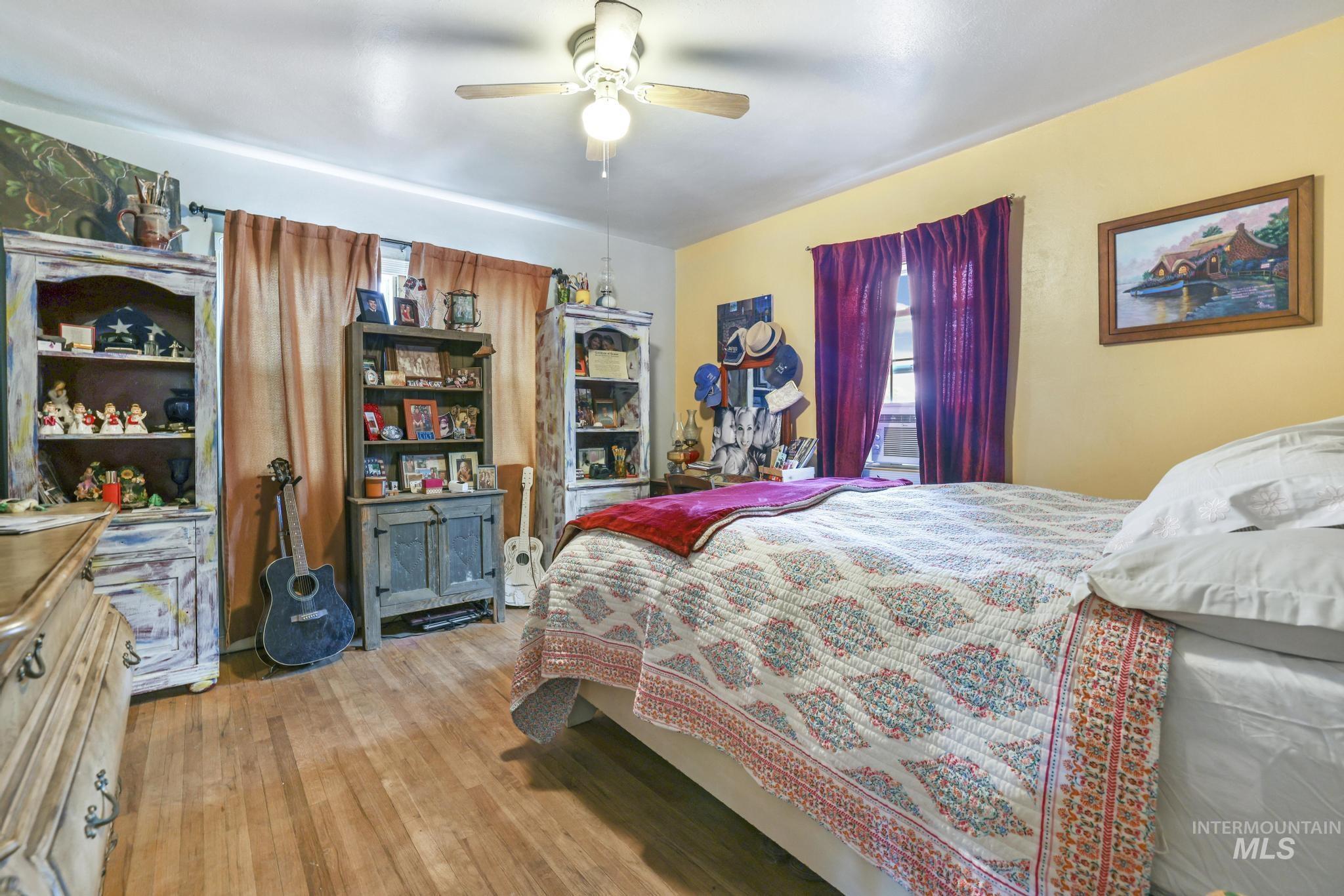 602 4th Avenue East Gooding, ID 83330 - Photo 11 of 36 Bedroom with wood finished floors and ceiling fan