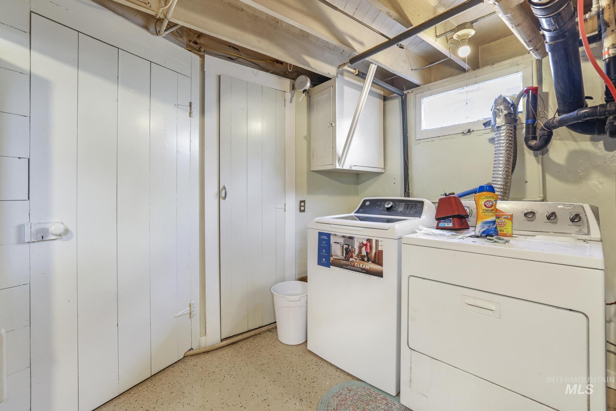 602 4th Avenue East Gooding, ID 83330 - Photo 20 of 36 Laundry area featuring separate washer and dryer and cabinet space