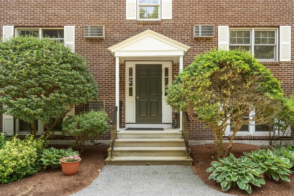 420 Great Road, Unit C1 Acton, MA 01720 - Photo 1 of 29 a front view of a house with plants