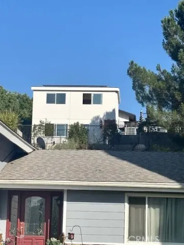 a house view with a outdoor space